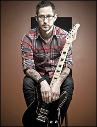 I can't play guitar standing up